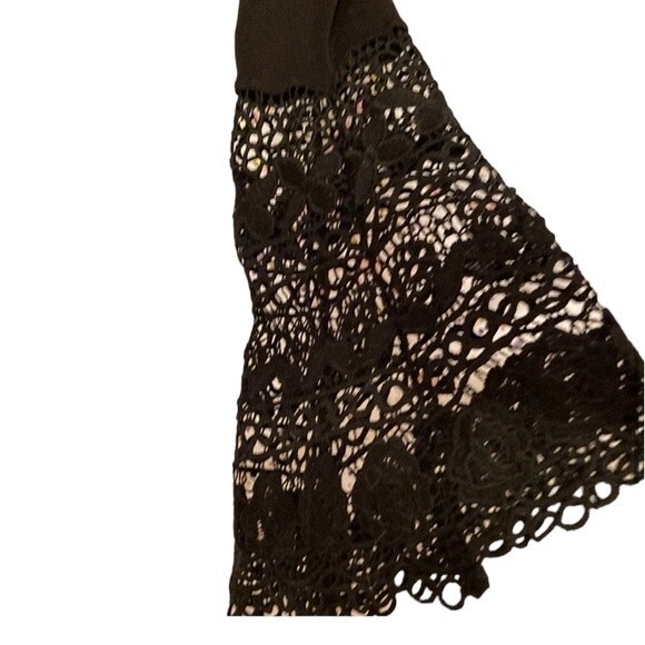 Peter Nygard black cotton/poly blouse with open weave trumpet sleeves. - Picture 4 of 5